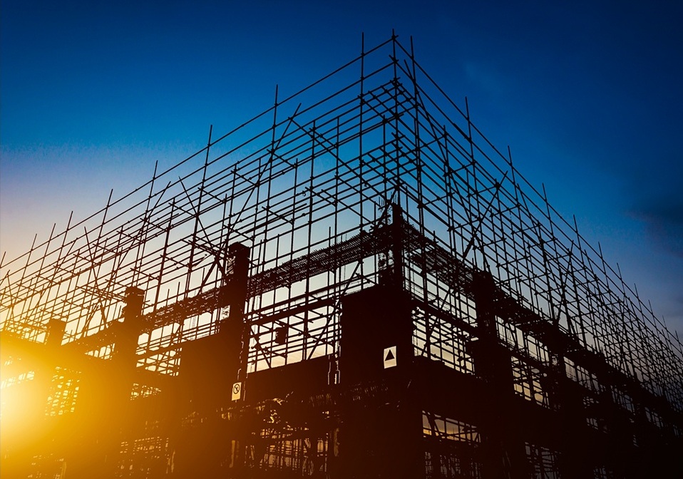 Construction framework at sunset